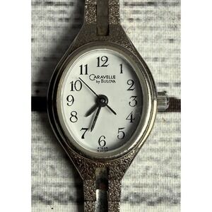 Caravelle by Bulova Womens Watch Silver Tone Oval White Dial Quartz